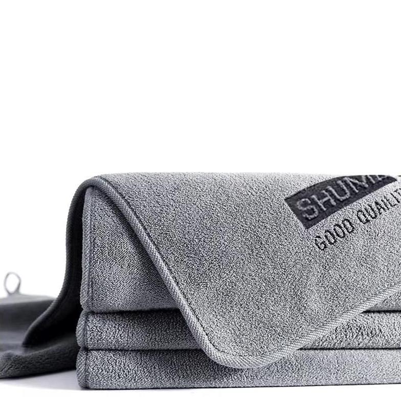 High-quality microfiber cloth for **cleaning** and **drying** cars.